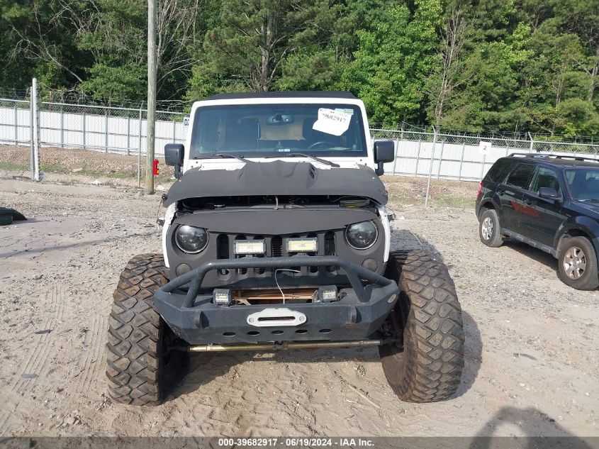 2014 Jeep Wrangler Unlimited Freedom Edition VIN: 1C4BJWDG4EL187202 Lot: 39682917