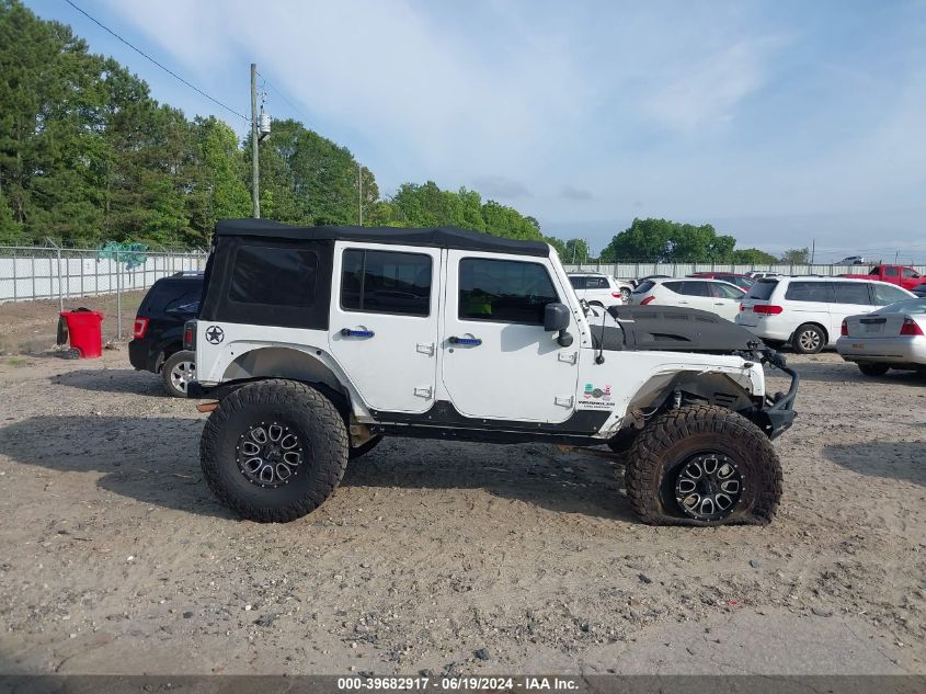 2014 Jeep Wrangler Unlimited Freedom Edition VIN: 1C4BJWDG4EL187202 Lot: 39682917