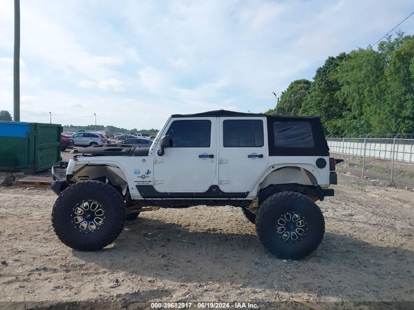 2014 Jeep Wrangler Unlimited Freedom Edition VIN: 1C4BJWDG4EL187202 Lot: 39682917