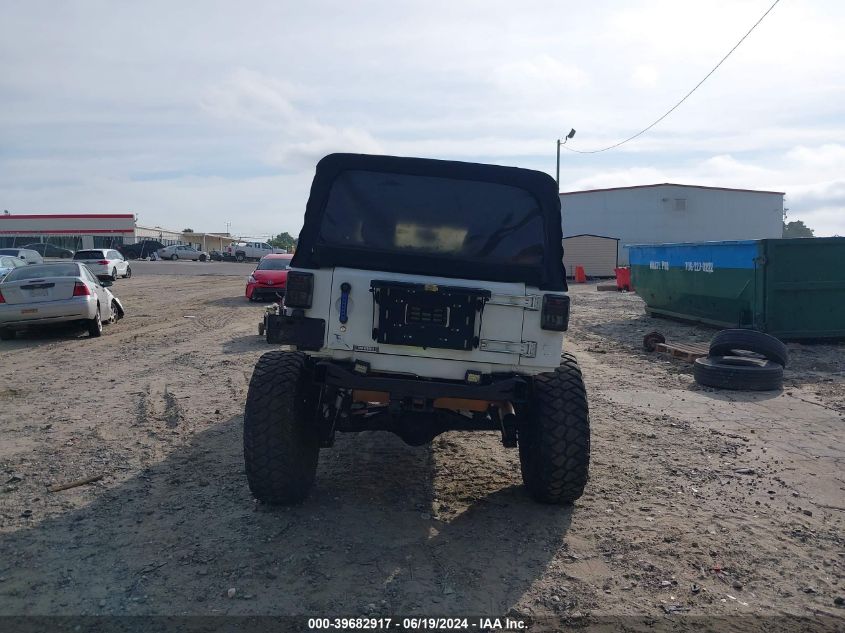 2014 Jeep Wrangler Unlimited Freedom Edition VIN: 1C4BJWDG4EL187202 Lot: 39682917