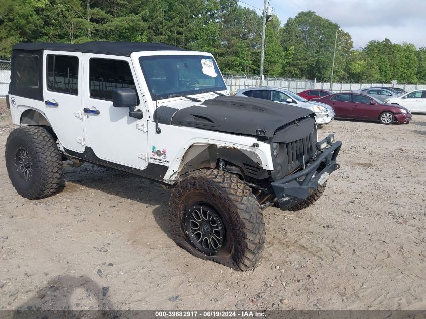 2014 Jeep Wrangler Unlimited Freedom Edition VIN: 1C4BJWDG4EL187202 Lot: 39682917