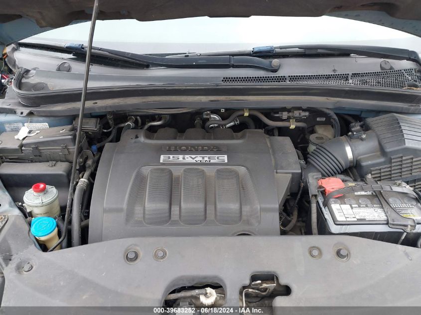 2007 Honda Odyssey Ex-L VIN: 5FNRL38707B099528 Lot: 39683252