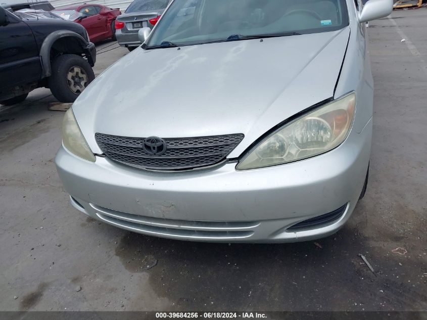 2003 Toyota Camry Le VIN: JTDBE32K930170159 Lot: 39684256
