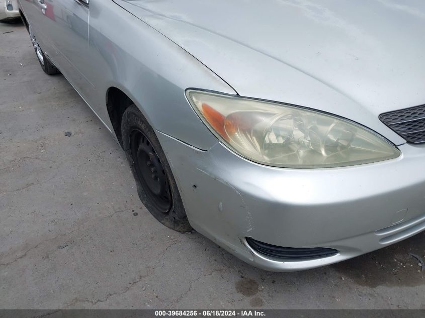 2003 Toyota Camry Le VIN: JTDBE32K930170159 Lot: 39684256