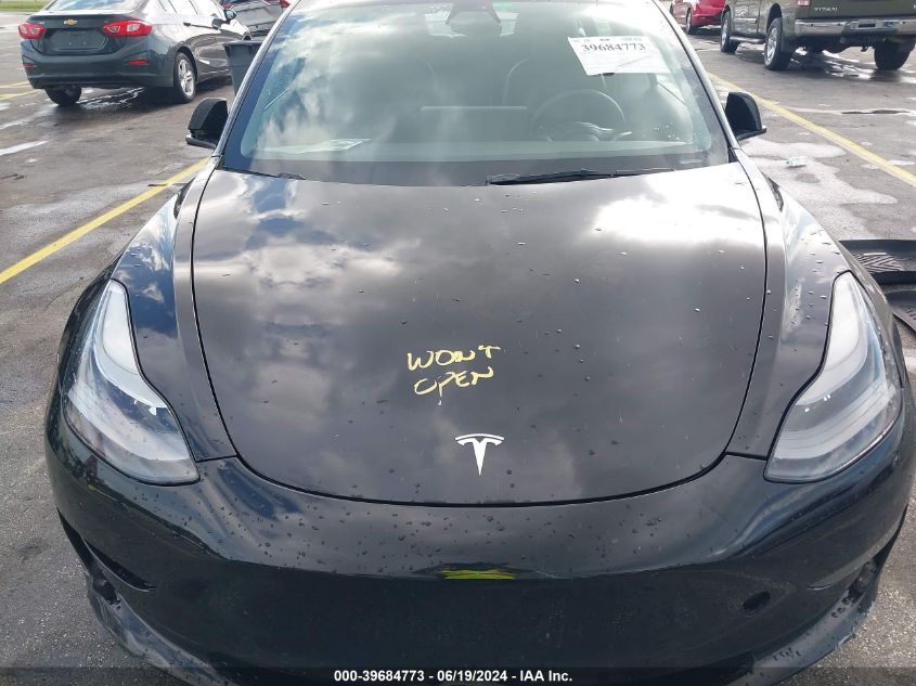 2021 Tesla Model 3 Standard Range Plus Rear-Wheel Drive VIN: 5YJ3E1EA7MF098392 Lot: 39684773