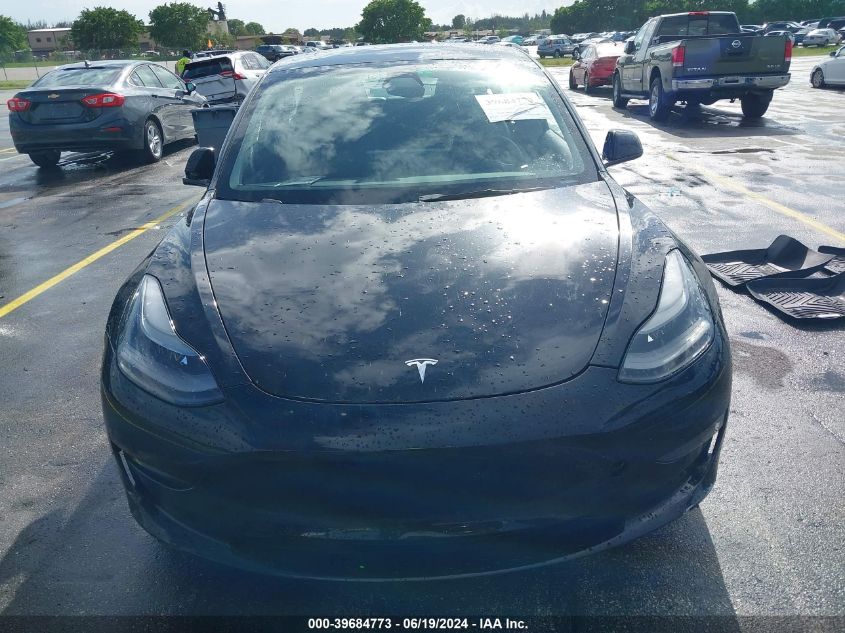 2021 Tesla Model 3 Standard Range Plus Rear-Wheel Drive VIN: 5YJ3E1EA7MF098392 Lot: 39684773