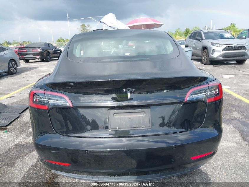 2021 Tesla Model 3 Standard Range Plus Rear-Wheel Drive VIN: 5YJ3E1EA7MF098392 Lot: 39684773