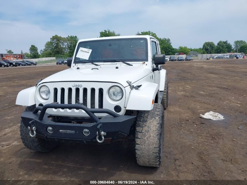 2011 Jeep Wrangler Unlimited Sahara VIN: 1J4BA5H12BL634583 Lot: 39684840