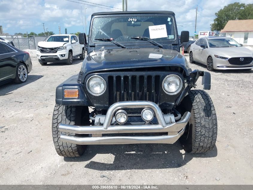 2002 Jeep Wrangler Sport VIN: 1J4FA49S82P765819 Lot: 39685610