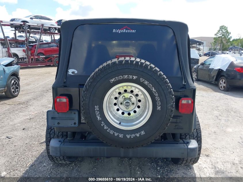 2002 Jeep Wrangler Sport VIN: 1J4FA49S82P765819 Lot: 39685610