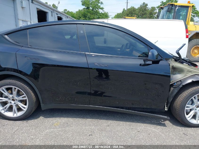 2023 Tesla Model Y Awd/Long Range Dual Motor All-Wheel Drive VIN: 7SAYGDEE2PA186114 Lot: 39687723