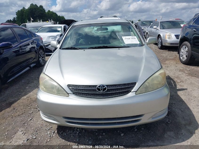 2004 Toyota Camry Le VIN: 4T1BE32KX4U271202 Lot: 39687828