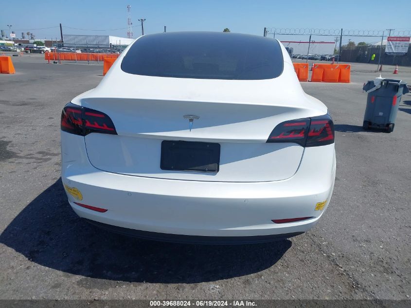 2021 Tesla Model 3 Standard Range Plus Rear-Wheel Drive VIN: 5YJ3E1EA5MF071126 Lot: 39688024