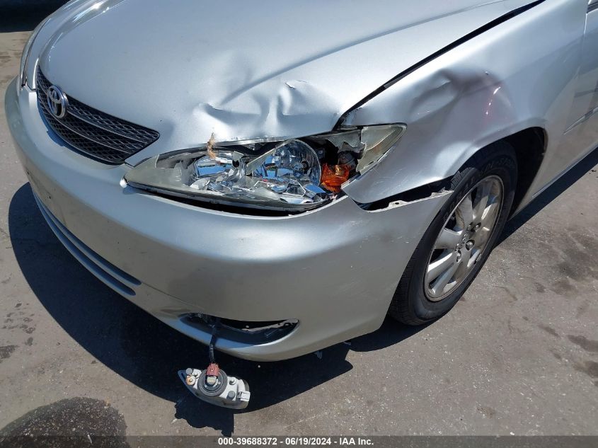 2003 Toyota Camry Le/Xle/Se VIN: 4T1BE30K23U148608 Lot: 39688372