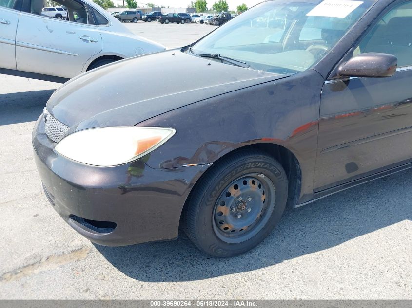 2003 Toyota Camry Le VIN: JTDBE32K430176080 Lot: 39690264