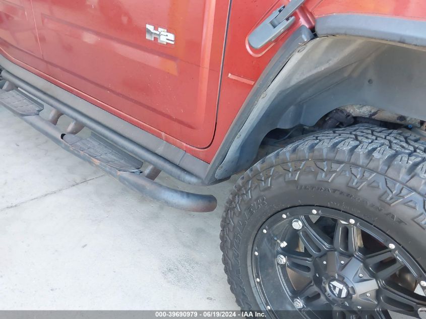 2003 Hummer H2 VIN: 5GRGN23U23H112894 Lot: 39690979