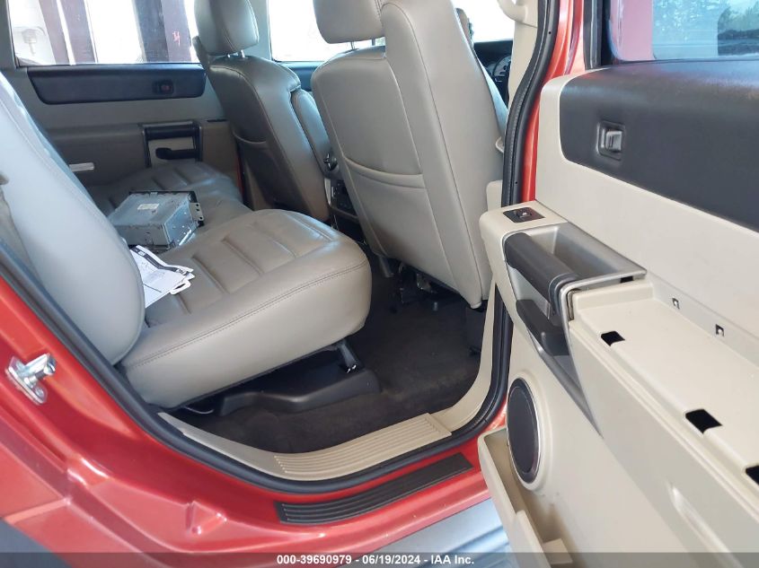 2003 Hummer H2 VIN: 5GRGN23U23H112894 Lot: 39690979