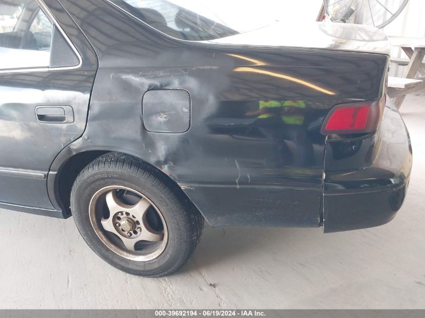 1999 Toyota Camry Le VIN: JT2BG22KXX0299028 Lot: 39692194