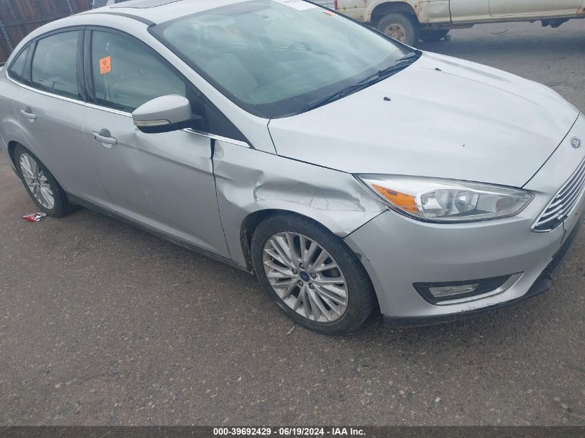 2018 Ford Focus Titanium VIN: 1FADP3J21JL326619 Lot: 39692429