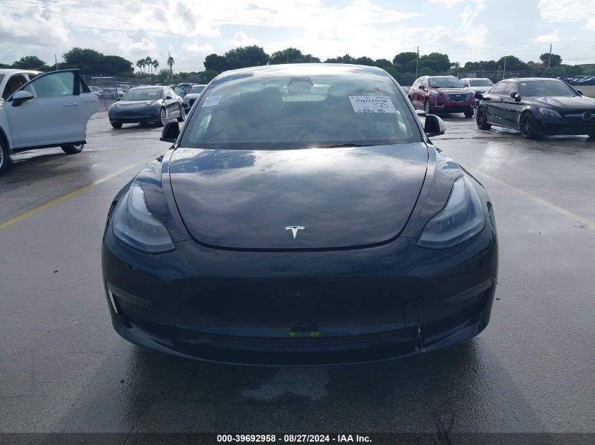 2023 Tesla Model 3 Long Range Dual Motor All-Wheel Drive VIN: 5YJ3E1EB6PF391844 Lot: 39692958