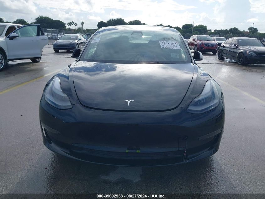 2023 Tesla Model 3 Long Range Dual Motor All-Wheel Drive VIN: 5YJ3E1EB6PF391844 Lot: 39692958