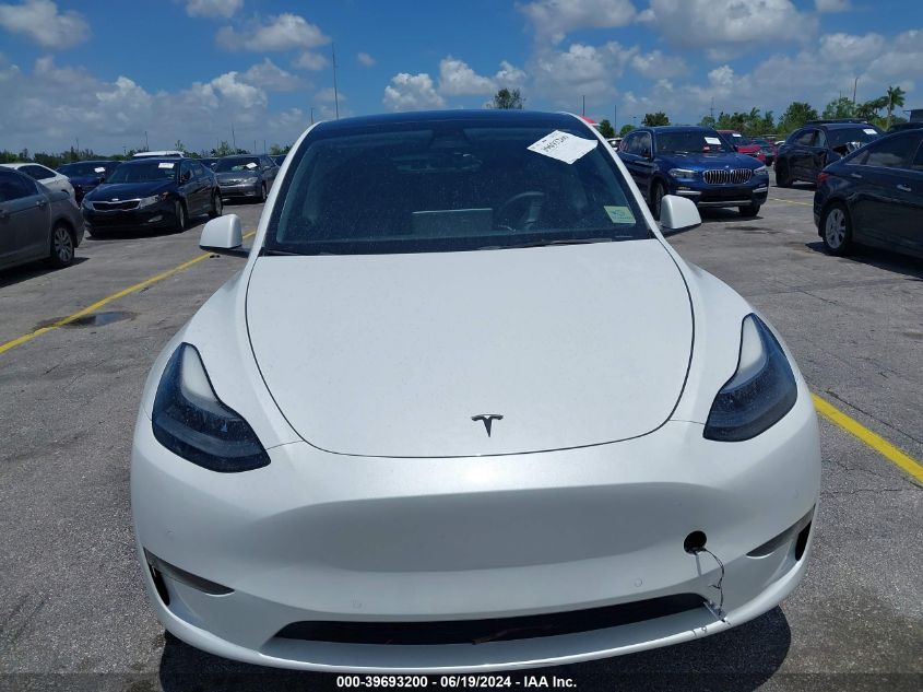 2022 Tesla Model Y Long Range Dual Motor All-Wheel Drive VIN: 7SAYGAEE8NF520550 Lot: 39693200