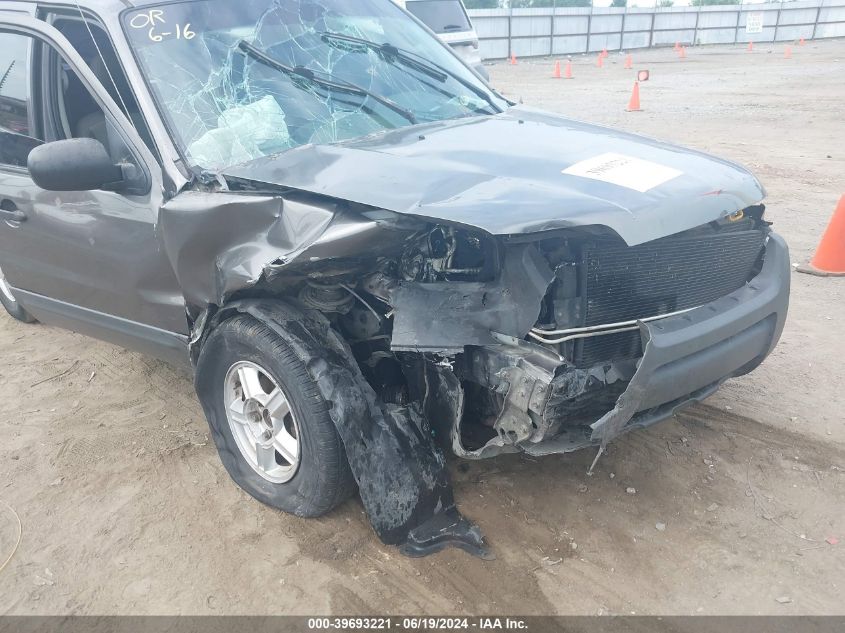 2003 Ford Escape VIN: 1FMY02103KA33355 Lot: 39693221