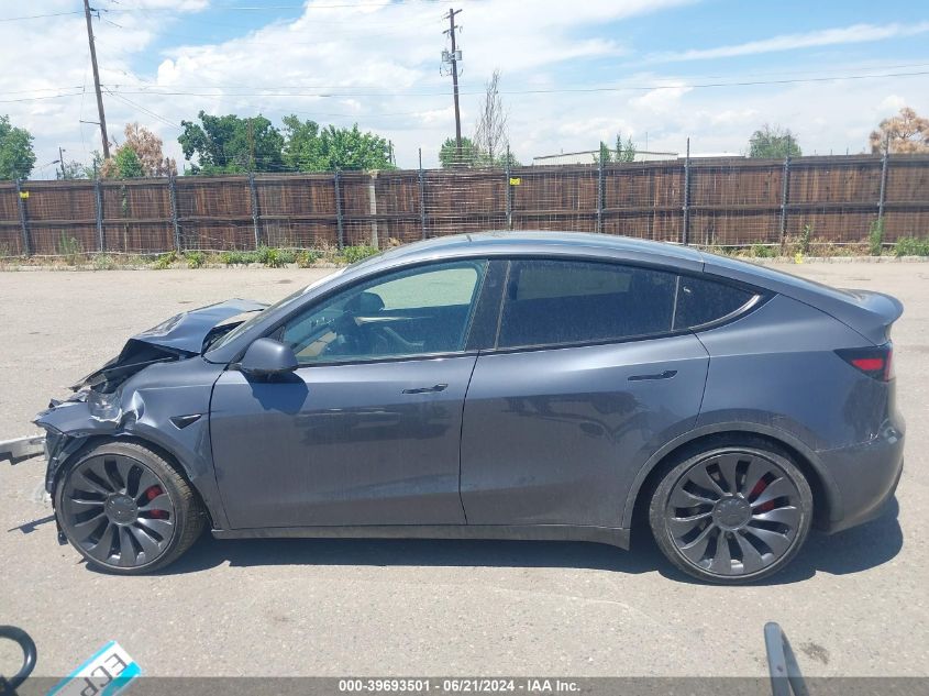 2023 Tesla Model Y Awd/Performance Dual Motor All-Wheel Drive VIN: 7SAYGDEF1PF899596 Lot: 39693501