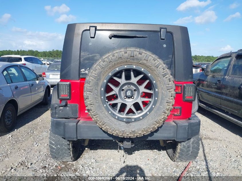 2007 Jeep Wrangler Unlimited X VIN: 1J4GA39177L187734 Lot: 39693561