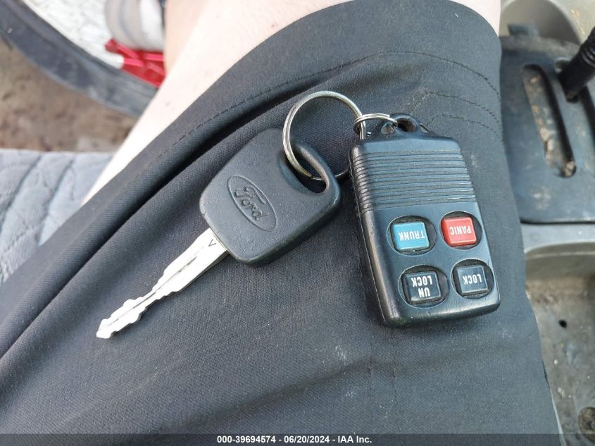 1999 Ford Contour Se VIN: 1FAFP66L4XK221809 Lot: 39694574