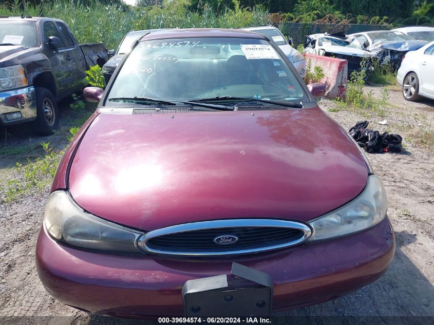 1999 Ford Contour Se VIN: 1FAFP66L4XK221809 Lot: 39694574