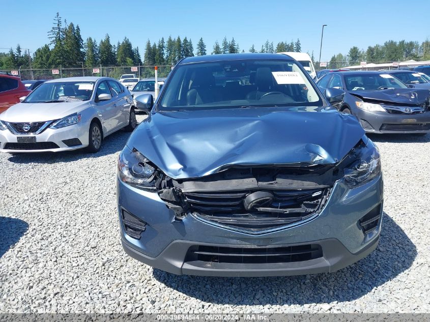 2016 Mazda Cx-5 Grand Touring VIN: JM3KE4DY9G0723896 Lot: 39694884