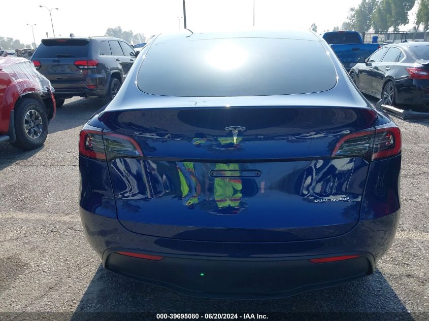 2023 Tesla Model Y Awd/Long Range Dual Motor All-Wheel Drive VIN: 7SAYGAEE4PF640204 Lot: 39695080