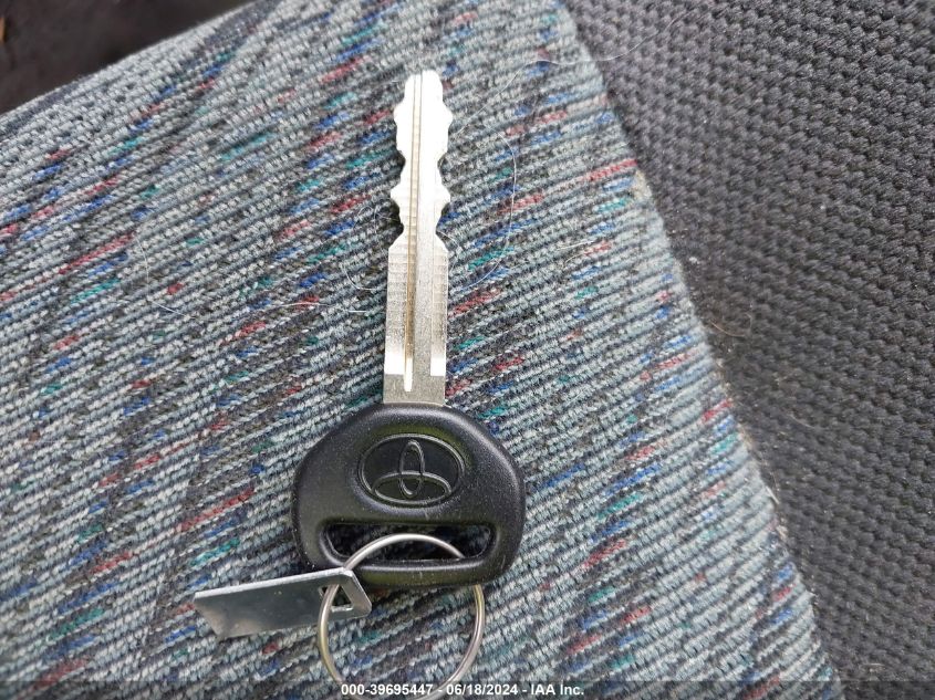 1999 Toyota Rav4 VIN: JT3GP10V2X7059228 Lot: 39695447