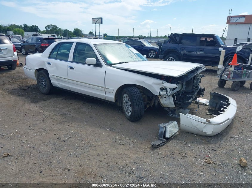 2004 Mercury Grand Marquis Gs VIN: 2MEFM74W94X664826 Lot: 39696254