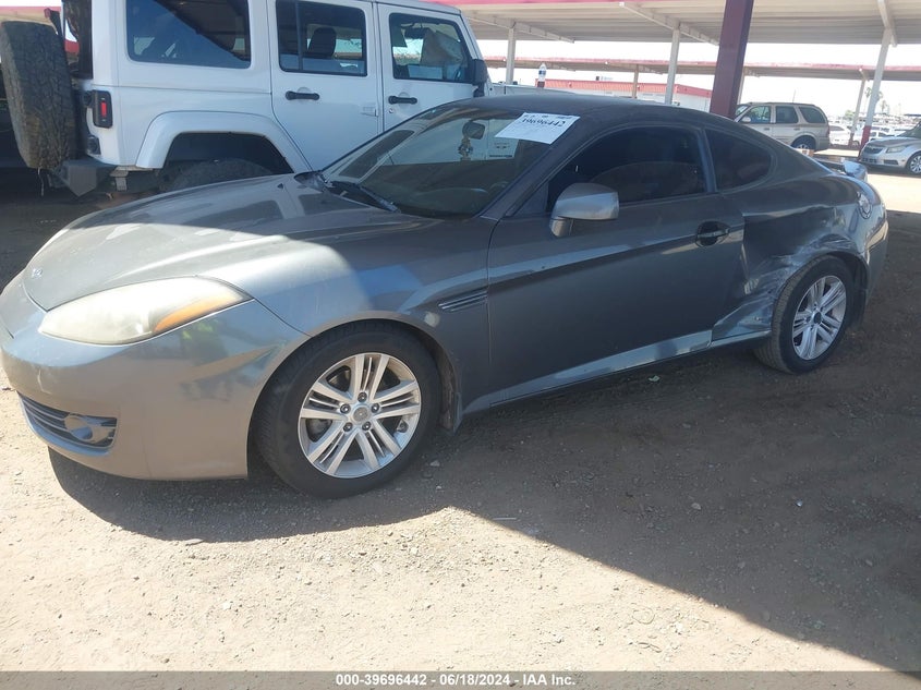 2007 Hyundai Tiburon Gs VIN: KMHHM66DX7U256679 Lot: 39696442