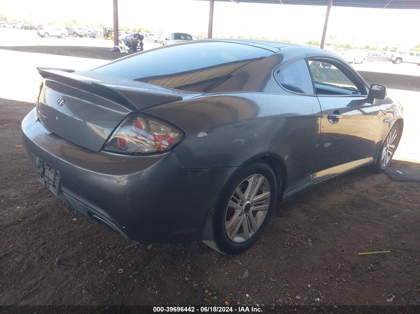 2007 Hyundai Tiburon Gs VIN: KMHHM66DX7U256679 Lot: 39696442