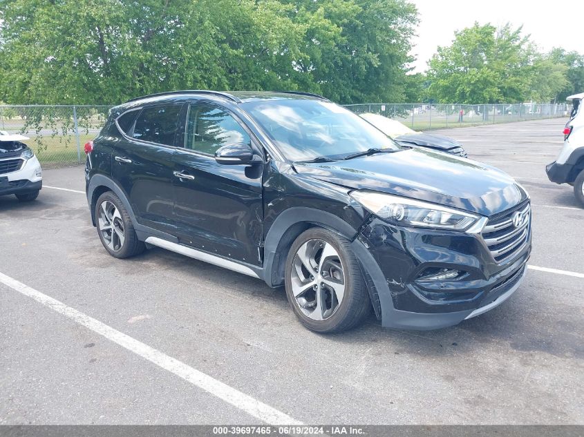 KM8J3CA22JU625079 2018 HYUNDAI TUCSON - Image 1