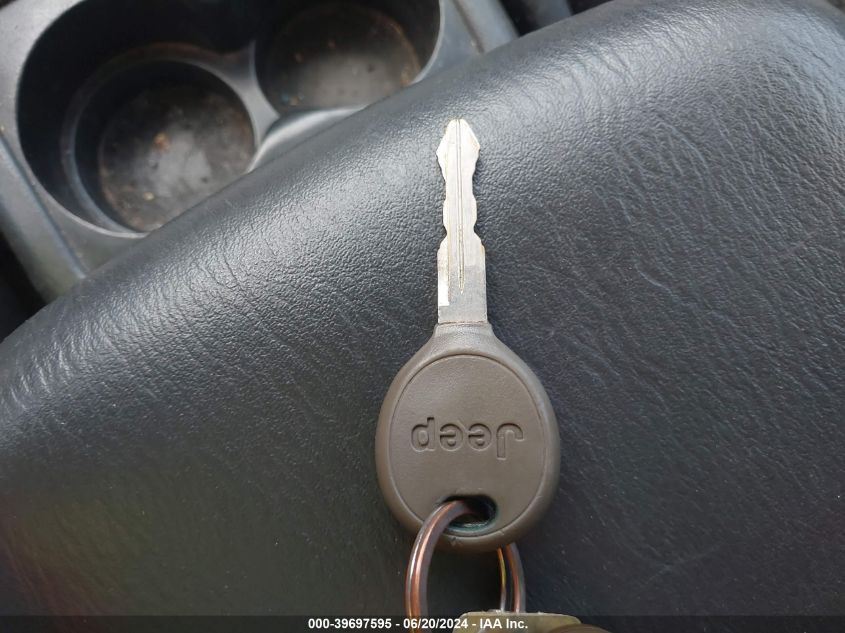 2004 Jeep Grand Cherokee Laredo VIN: 1J4GW48S74C318965 Lot: 39697595