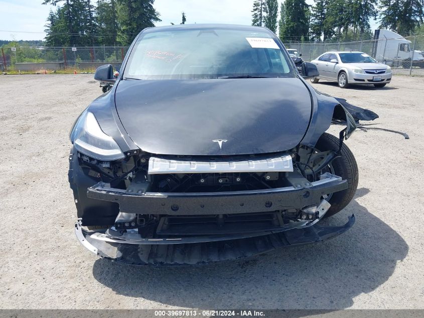 2023 Tesla Model Y Awd/Long Range Dual Motor All-Wheel Drive VIN: 7SAYGDEE0PF920350 Lot: 39697813