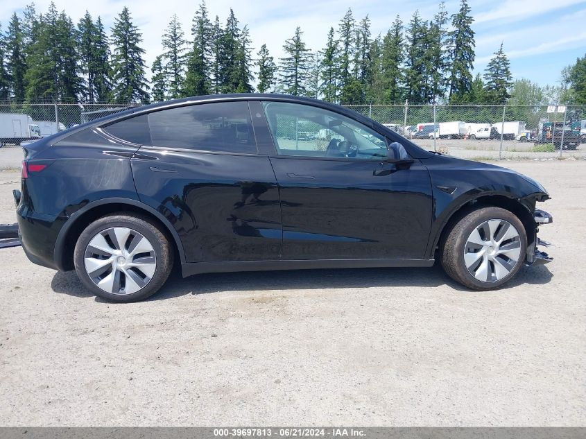 2023 Tesla Model Y Awd/Long Range Dual Motor All-Wheel Drive VIN: 7SAYGDEE0PF920350 Lot: 39697813