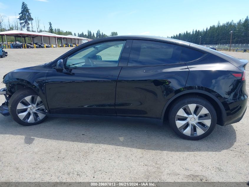 2023 Tesla Model Y Awd/Long Range Dual Motor All-Wheel Drive VIN: 7SAYGDEE0PF920350 Lot: 39697813