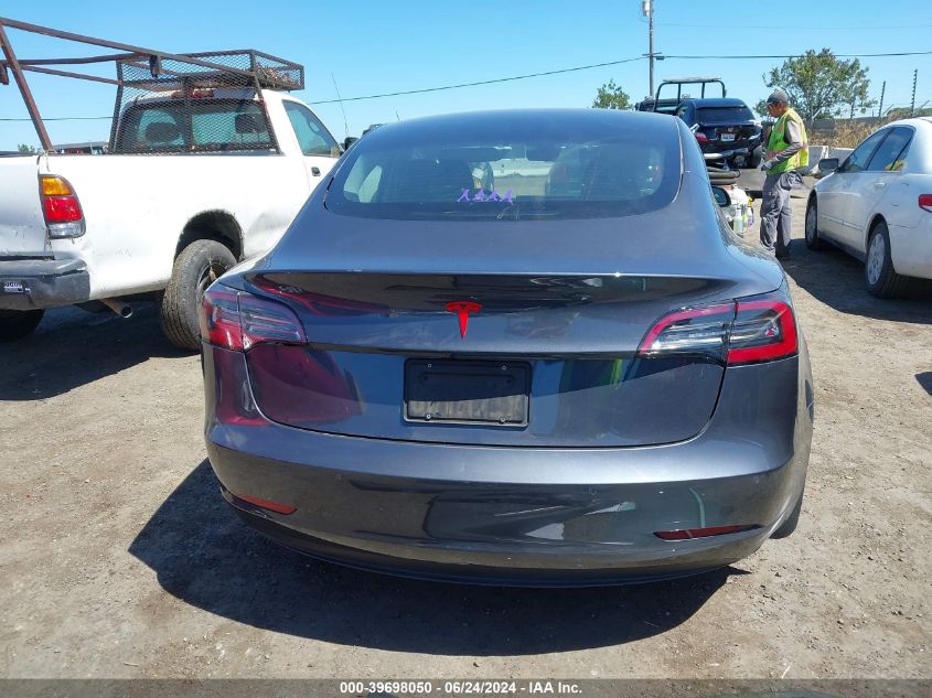 2021 Tesla Model 3 Standard Range Plus Rear-Wheel Drive VIN: 5YJ3E1EA8MF994698 Lot: 39698050