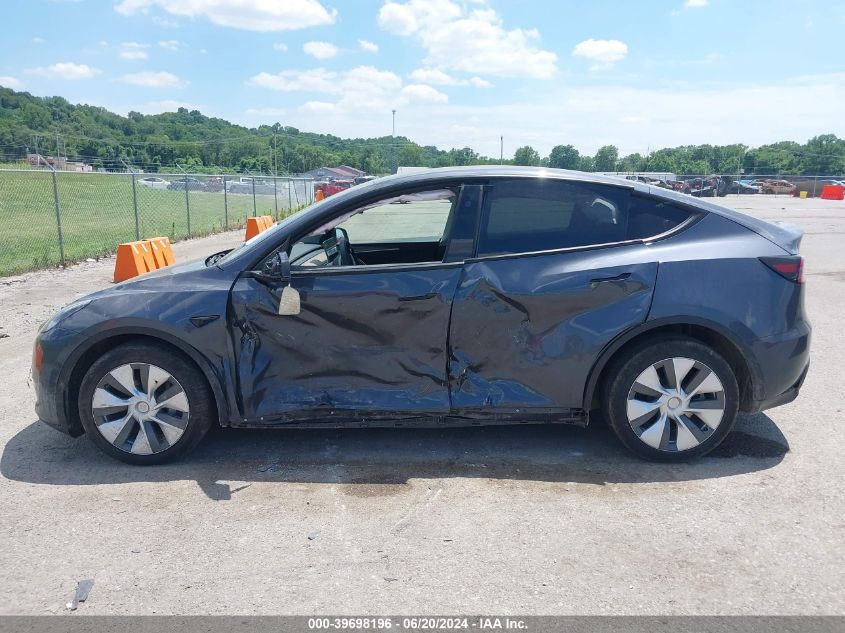 2023 Tesla Model Y Awd/Long Range Dual Motor All-Wheel Drive VIN: 7SAYGDEE8PA036802 Lot: 39698196