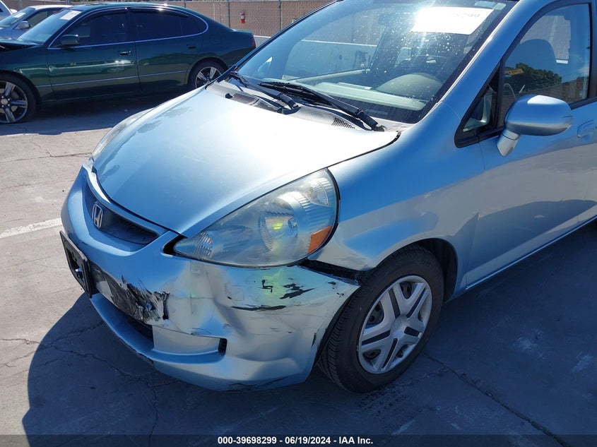 2007 Honda Fit VIN: JHMGD38447S060078 Lot: 39698299