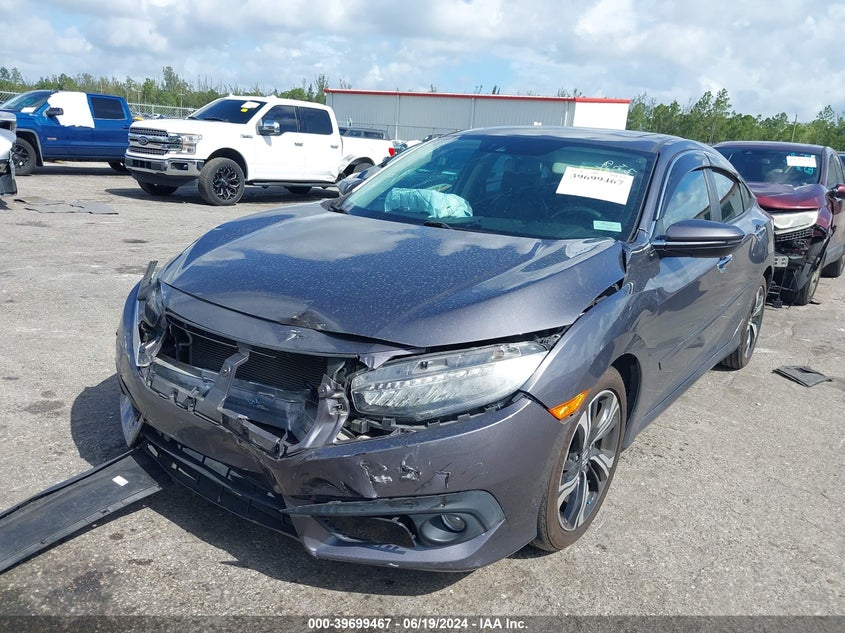 VIN 19XFC1F91HE001397 2017 HONDA CIVIC TOURING