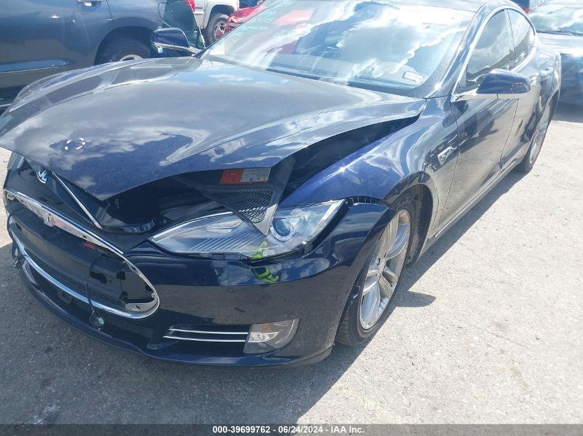 2014 Tesla Model S VIN: 5YJSA1S15EFP63173 Lot: 39699762