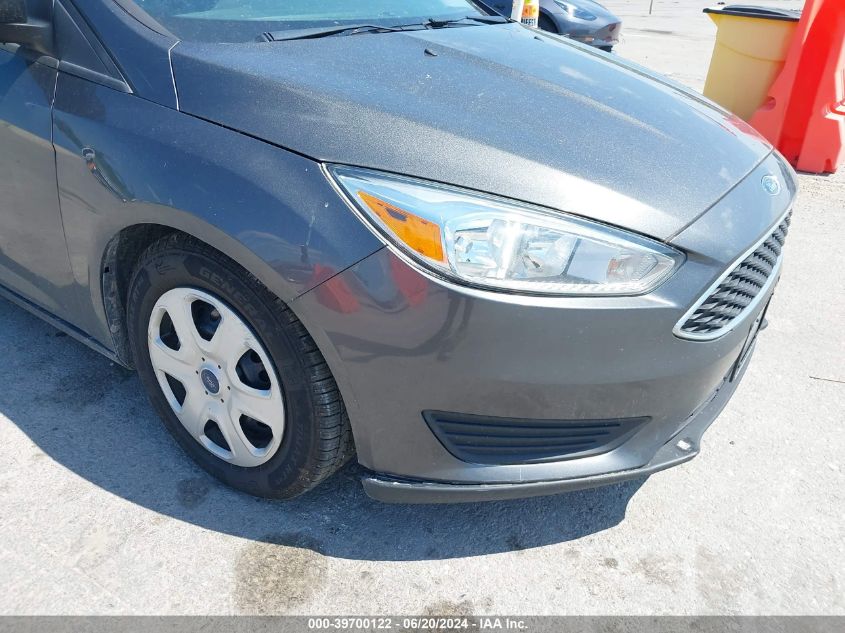 2015 Ford Focus S VIN: 1FADP3E26FL299967 Lot: 39700122