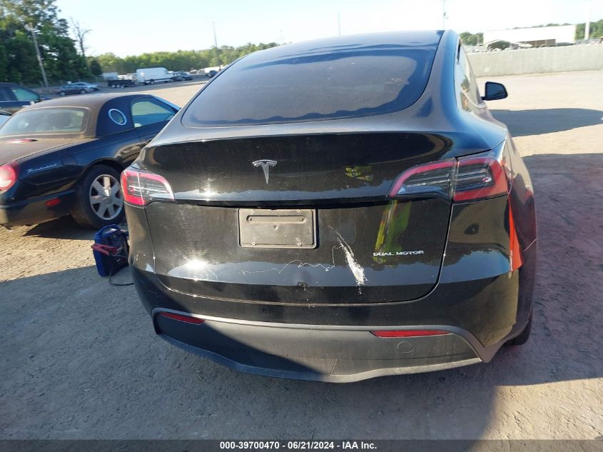 2023 Tesla Model Y Awd/Long Range Dual Motor All-Wheel Drive VIN: 7SAYGAEE9PF862575 Lot: 39700470