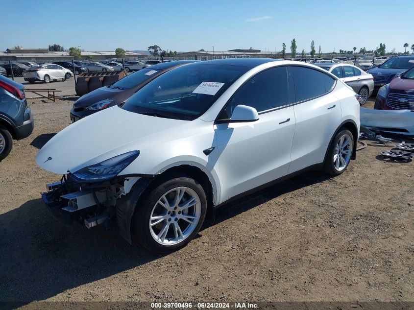 2023 Tesla Model Y Awd/Long Range Dual Motor All-Wheel Drive VIN: 7SAYGDEEXPA063631 Lot: 39700496